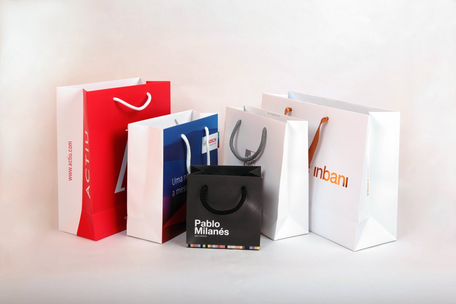 Bolsas de lujo personalizadas con asas de cordón y cinta